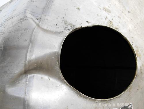 Used Tank, 5,000 Gallon, 304 Stainless Steel, Vertical. Approximate 102" diameter x 144" straight side. Dish top and bottom. Side bottom agitator, 3 blade prop, driven by a 5 HP, 3/60/230/460 Volt, 1...