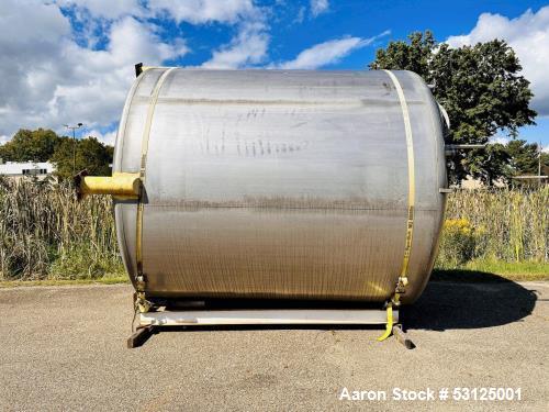 Used- Paul Mueller 6000 Gallon Stainless Steel Vertical Storage Tank. Overall Dimensions are approx. 11W x 11L x 14H. Multip...