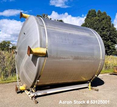 Used- Paul Mueller 6000 Gallon Stainless Steel Vertical Storage Tank. Overall Dimensions are approx. 11W x 11L x 14H. Multip...