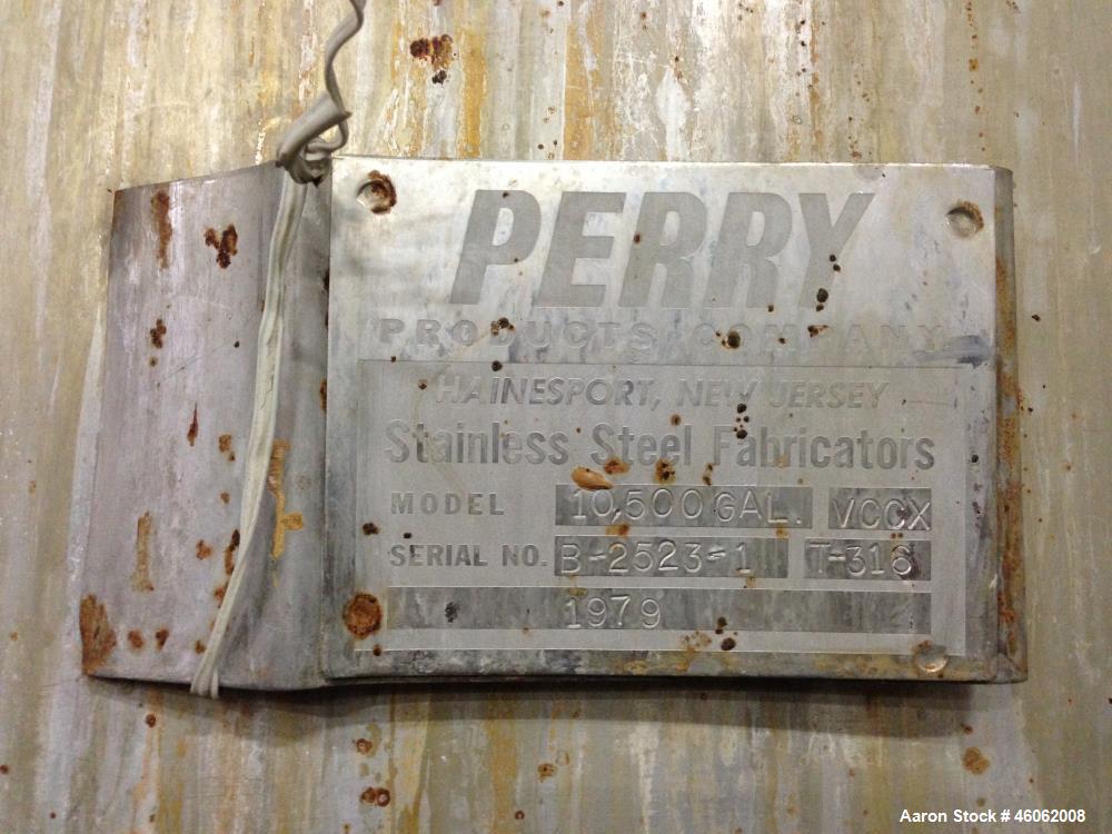 Used Perry 10,500 Gallon 316 Stainless Steel Storage Tank. Approx. 11' Diameter x 14' Straight Side. Cone Bottom. Mounted on 6 I-Beam legs. Approx. 3" CBO. Serial Number B.2523-1. Model VCCX. Built 1...
