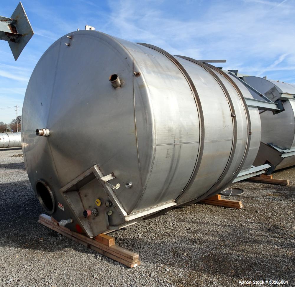 Used Perry Products Tank, 5,200 Gallon, Model VCCX, 304 Stainless Steel, Vertical. Approximate 106" diameter x 132" straight side, coned top & bottom. (1) Spray nozzle. Openings top (2) 2", 3", 4", 1...