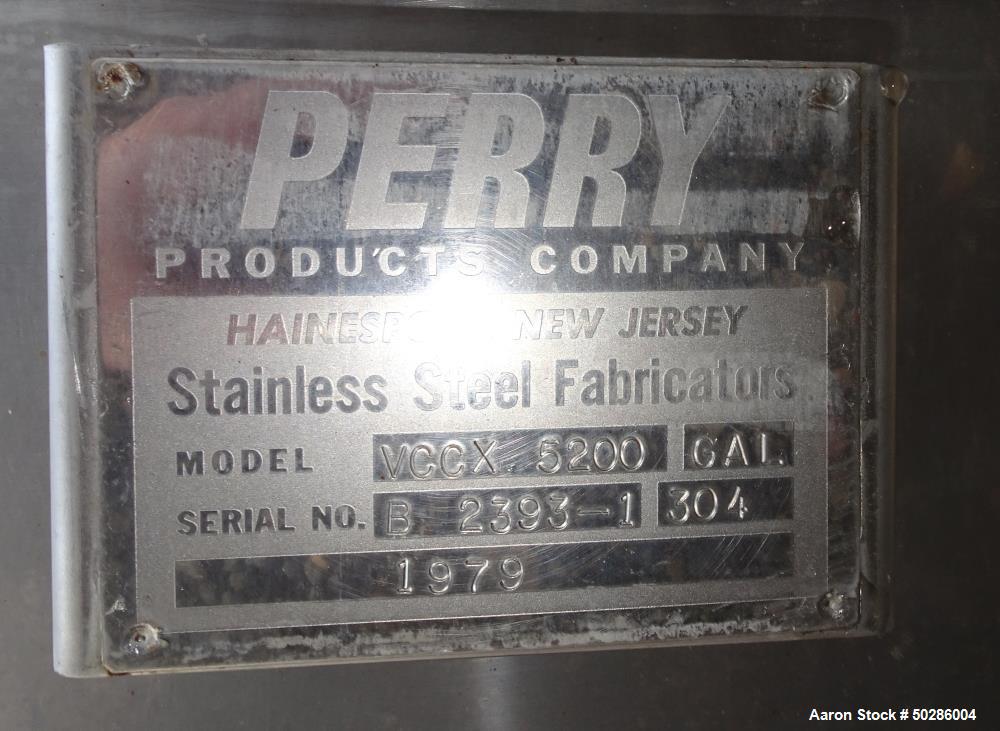 Used Perry Products Tank, 5,200 Gallon, Model VCCX, 304 Stainless Steel, Vertical. Approximate 106" diameter x 132" straight side, coned top & bottom. (1) Spray nozzle. Openings top (2) 2", 3", 4", 1...