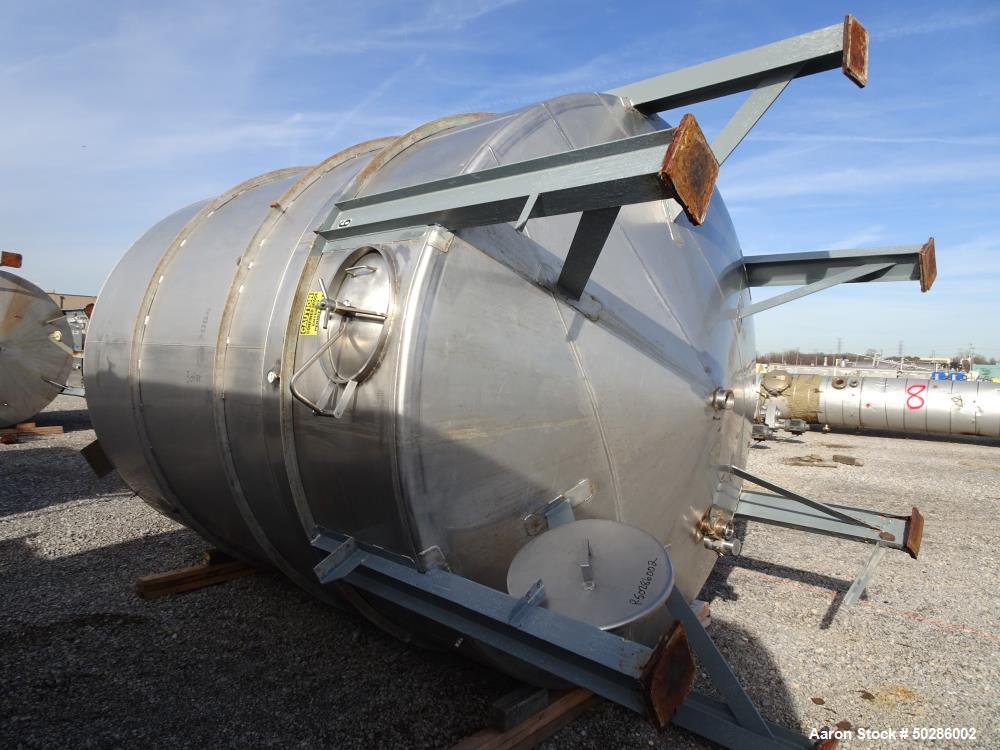 Used Perry Products Tank, 5,200 Gallon, Model VCWX, 304 Stainless Steel, Vertical. Approximate 106" diameter x 132" straight side, coned top & bottom. (1) Spray nozzle. Openings top 2", 3", (2) 4", 1...