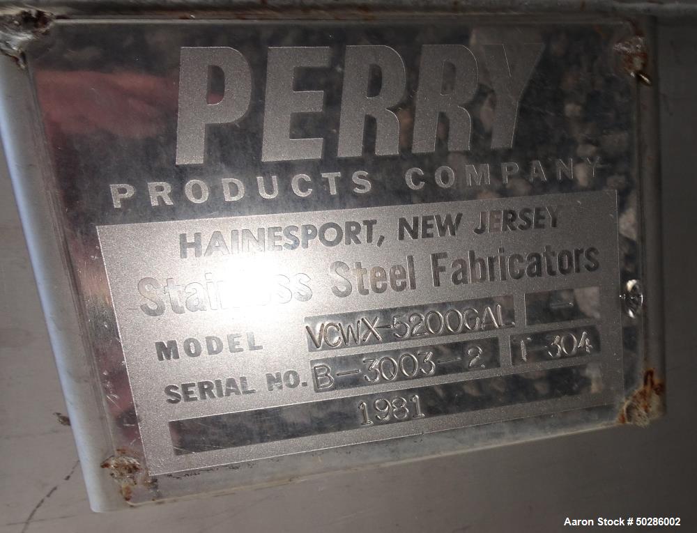 Used Perry Products Tank, 5,200 Gallon, Model VCWX, 304 Stainless Steel, Vertical. Approximate 106" diameter x 132" straight side, coned top & bottom. (1) Spray nozzle. Openings top 2", 3", (2) 4", 1...