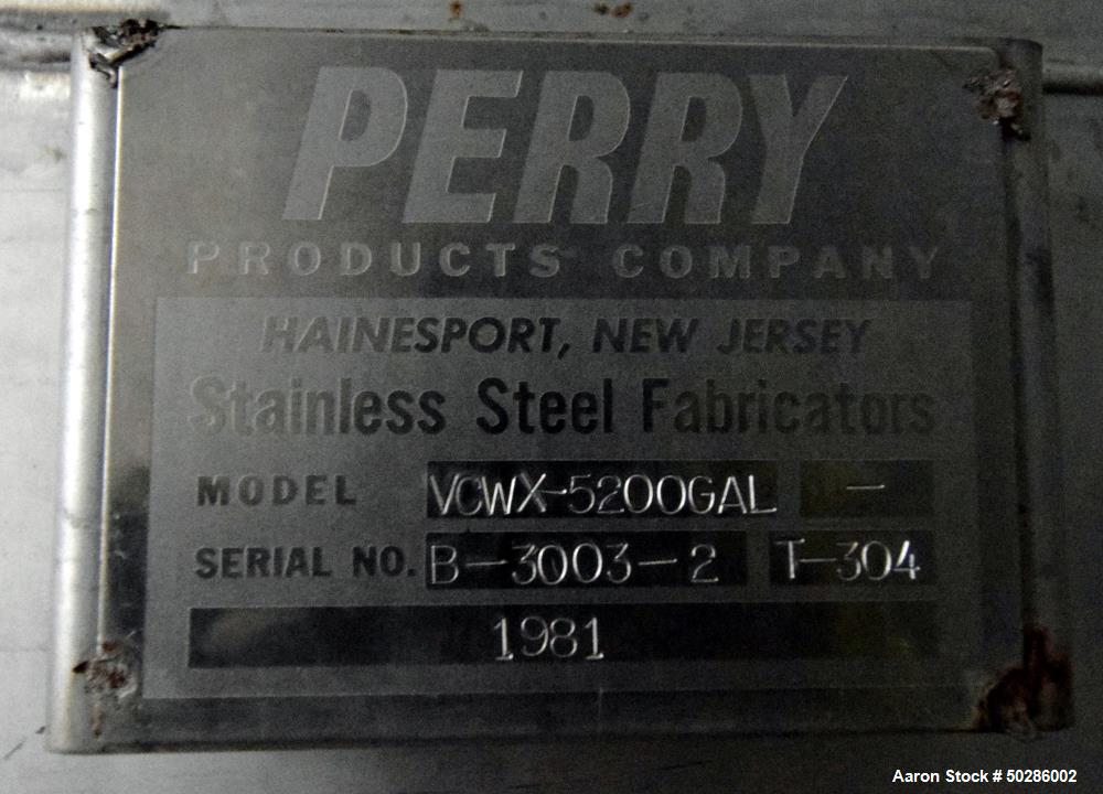 Used Perry Products Tank, 5,200 Gallon, Model VCWX, 304 Stainless Steel, Vertical. Approximate 106" diameter x 132" straight side, coned top & bottom. (1) Spray nozzle. Openings top 2", 3", (2) 4", 1...