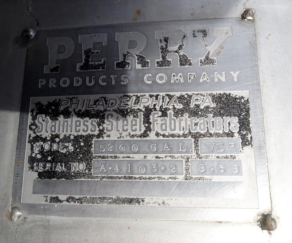 Used Perry Products Tank, 5,200 Gallon, 304 Stainless Steel, Vertical. Approximate 106" diameter x 132" straight side, coned top & bottom. (1) Spray nozzle. Openings top 2", 3", (2) 4", 18" man way w...