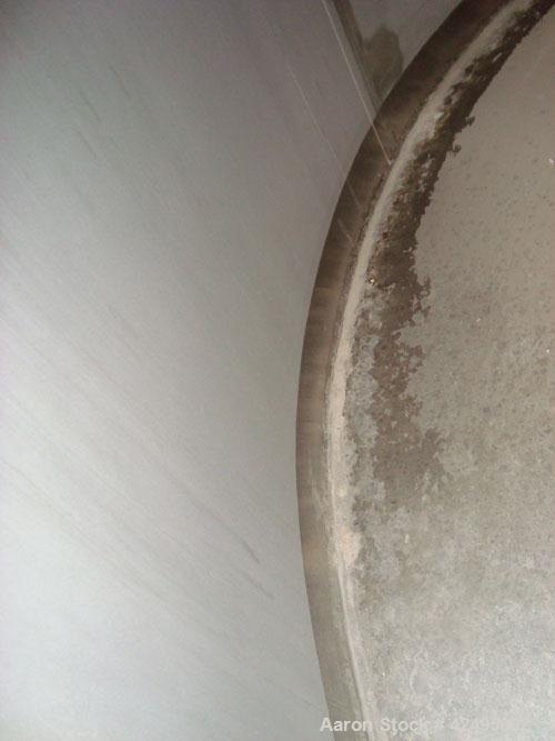 Unused- Precision Stainless Storage Tank, 6160 gallon, 304L stainless steel, vertical. 120" Diameter x 126" straight side. Dished top, 1/8" pitch sloping bottom. Internal rated 1.2 specific gravity, ...