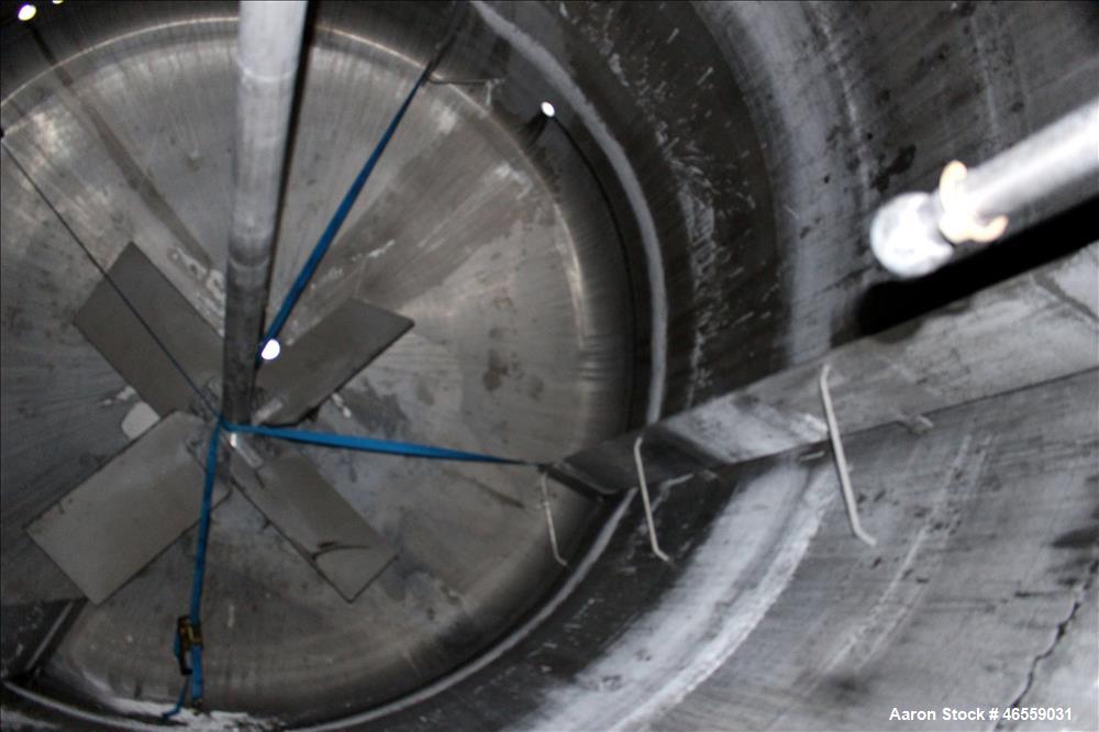 Used Precision Stainless Mixing Tank, 10,000 Gallon, 316L Stainless Steel, Vertical. Approximate 144" diameter x 142" straight side. Dished top and bottom heads. Insulated, 304 stainless steel dimple...