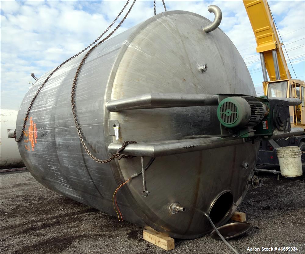 Used Precision Stainless Mixing Tank, 12,000 Gallon, 316L Stainless Steel, Vertical. Approximate 144" diameter x 166" straight side. Dished top and bottom heads. Insulated. 304L Stainless steel dimpl...