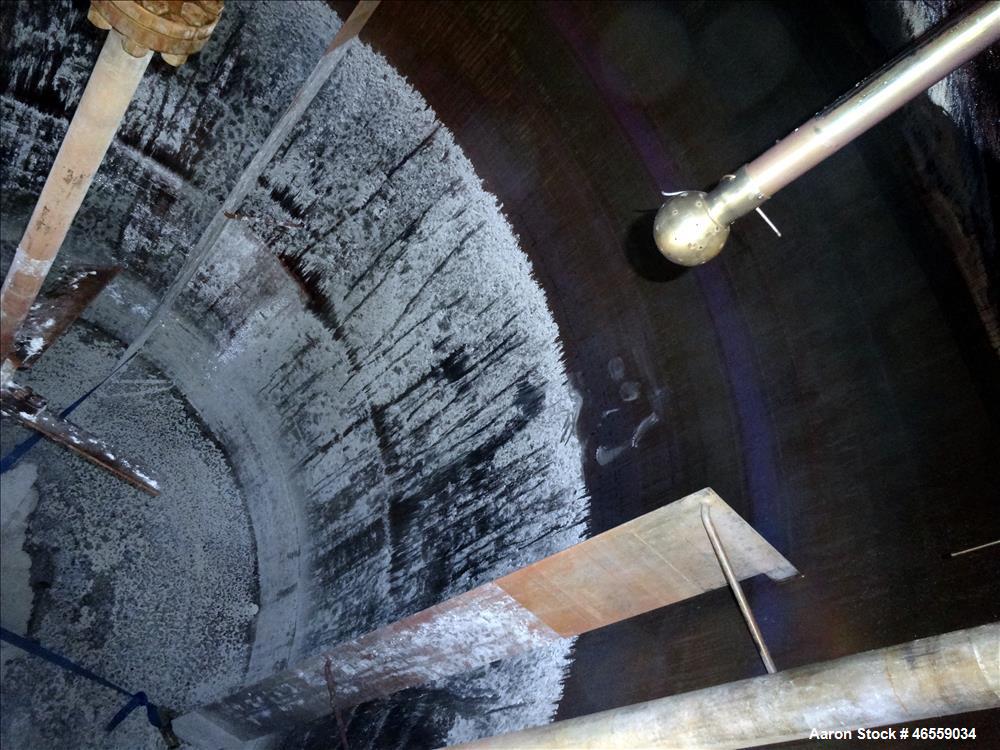 Used Precision Stainless Mixing Tank, 12,000 Gallon, 316L Stainless Steel, Vertical. Approximate 144" diameter x 166" straight side. Dished top and bottom heads. Insulated. 304L Stainless steel dimpl...