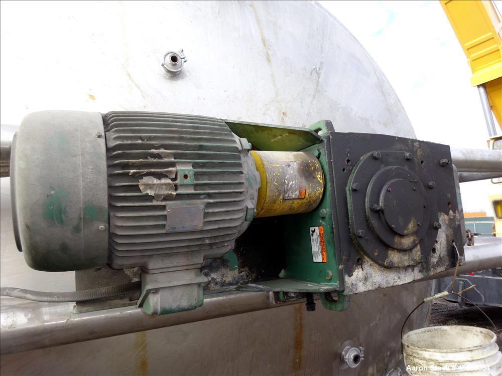 Used Precision Stainless Mixing Tank, 12,000 Gallon, 316L Stainless Steel, Vertical. Approximate 144" diameter x 166" straight side. Dished top and bottom heads. Insulated. 304L Stainless steel dimpl...
