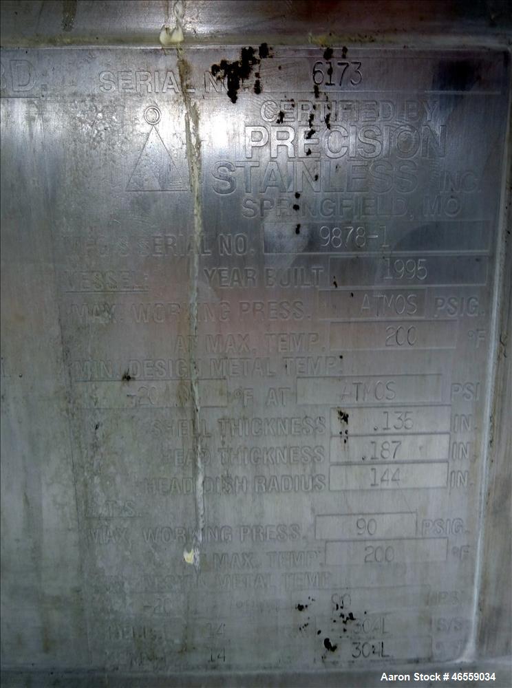 Used Precision Stainless Mixing Tank, 12,000 Gallon, 316L Stainless Steel, Vertical. Approximate 144" diameter x 166" straight side. Dished top and bottom heads. Insulated. 304L Stainless steel dimpl...