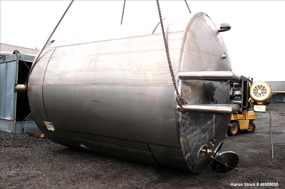 Used Precision Stainless Mixing Tank, 12,000 Gallon, 316L Stainless Steel, Vertical. Approximate 144" diameter x 166" straight side. Dished top and bottom heads. Insulated. 304L Stainless steel dimpl...