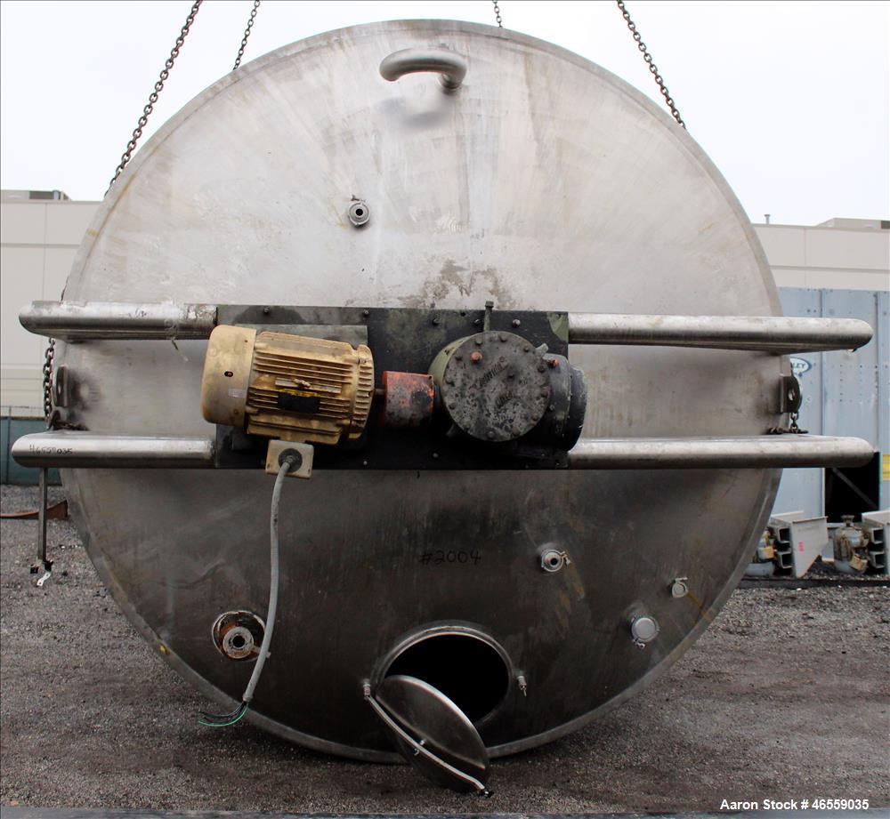 Used Precision Stainless Mixing Tank, 12,000 Gallon, 316L Stainless Steel, Vertical. Approximate 144" diameter x 166" straight side. Dished top and bottom heads. Insulated. 304L Stainless steel dimpl...