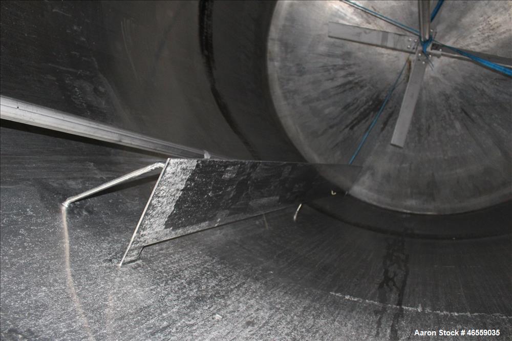 Used Precision Stainless Mixing Tank, 12,000 Gallon, 316L Stainless Steel, Vertical. Approximate 144" diameter x 166" straight side. Dished top and bottom heads. Insulated. 304L Stainless steel dimpl...