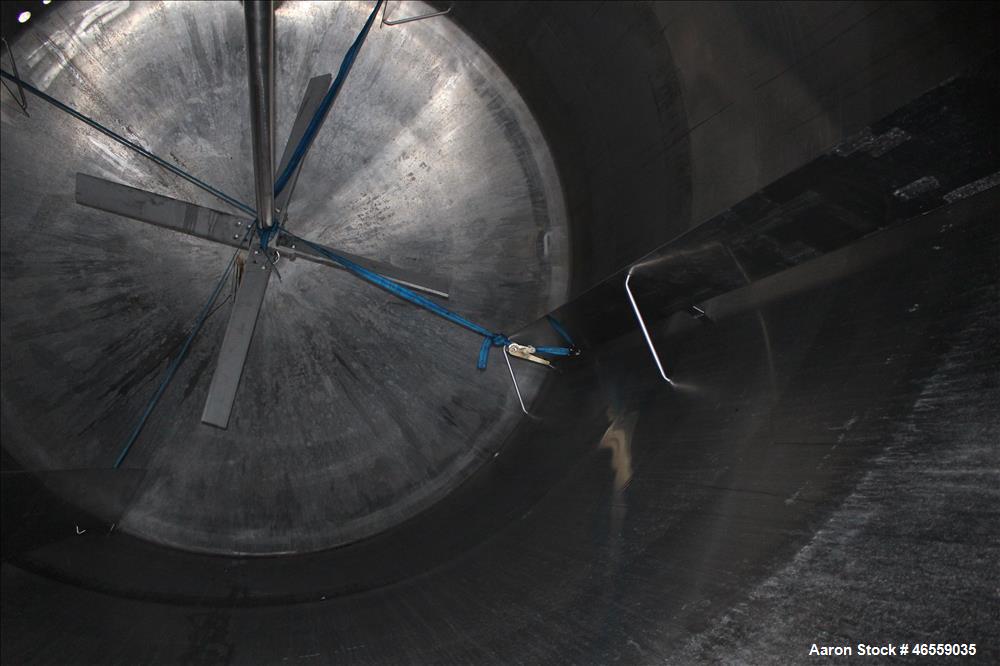 Used Precision Stainless Mixing Tank, 12,000 Gallon, 316L Stainless Steel, Vertical. Approximate 144" diameter x 166" straight side. Dished top and bottom heads. Insulated. 304L Stainless steel dimpl...