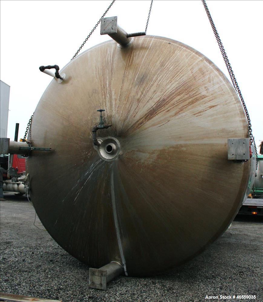 Used Precision Stainless Mixing Tank, 12,000 Gallon, 316L Stainless Steel, Vertical. Approximate 144" diameter x 166" straight side. Dished top and bottom heads. Insulated. 304L Stainless steel dimpl...