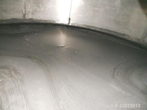 Used Saracco Tank & Mfg Approximately 5,200 Gallon Stainless Steel Storage Tank. Approximately 9' diameter x 11' straight side. Flat bottom and slight cone top. Various top openings including a 17" m...