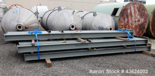 Used Springs Fabrication Product Hopper/Silo, 739.44 cubic feet (5533 gallon), 304 stainless steel, vertical. Approximately 78" diameter x 236" straight side. Flat welded top, 48" coned bottom, rated...