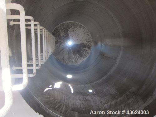 Used Springs Fabrication Product Hopper/Silo, 739.44 cubic feet (5533 gallon), 304 stainless steel, vertical. Approximately 78" diameter x 236" straight side. Flat welded top, 48" coned bottom, rated...