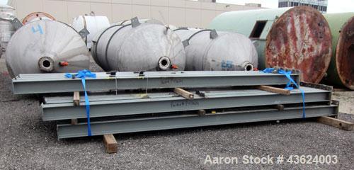 Used Springs Fabrication Product Hopper/Silo, 739.44 cubic feet (5533 gallon), 304 stainless steel, vertical. Approximately 78" diameter x 236" straight side. Flat welded top, 48" coned bottom, rated...