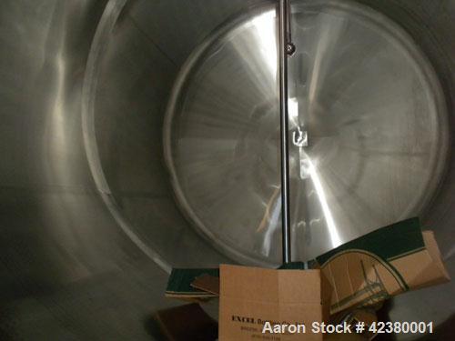 Used St. Regis Tank, Approximately 5000 Gallon, 304 stainless steel, horizontal. 96" Diameter x 150" straight side, dished heads. Bottom 1/2 dimple jacketed, rated 150 psi. (2) Internal CIP spray bal...