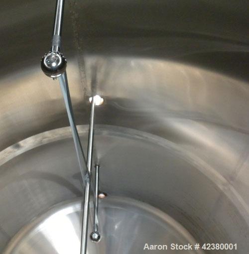 Used St. Regis Tank, Approximately 5000 Gallon, 304 stainless steel, horizontal. 96" Diameter x 150" straight side, dished heads. Bottom 1/2 dimple jacketed, rated 150 psi. (2) Internal CIP spray bal...