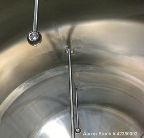 Used St. Regis Tank, Approximately 5000 Gallon, 304 stainless steel, horizontal. 96" Diameter x 150" straight side, dished heads. Bottom 1/2 dimple jacketed, rated 150 psi. (2) Internal CIP spray bal...