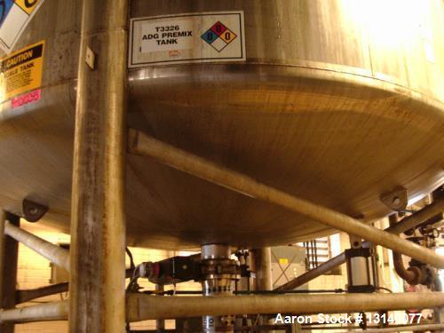 Used- Stainless Fabrication Inc. Approximately 14,700 Gallon Stainless Steel Vertical Mix Tank. 144" diameter x 209" high st...