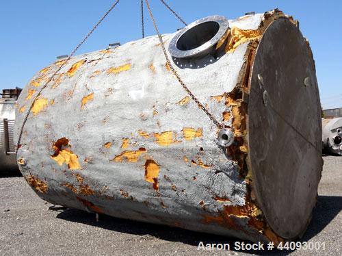 Used Stainless Metals Inc Tank, 8800 Gallon, 304L Stainless Steel, Vertical. Approximate 120" diameter x 180" straight side, dished top, flat bottom. Openings top (12) 3", 24" man way with cover, sid...