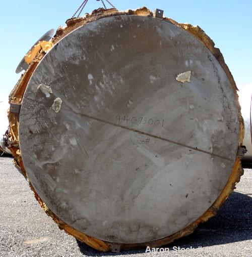 Used Stainless Metals Inc Tank, 8800 Gallon, 304L Stainless Steel, Vertical. Approximate 120" diameter x 180" straight side, dished top, flat bottom. Openings top (12) 3", 24" man way with cover, sid...