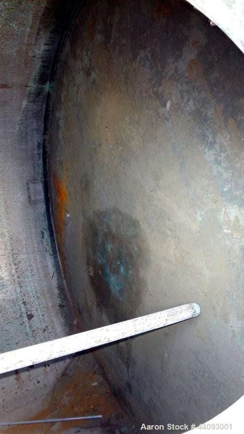 Used Stainless Metals Inc Tank, 8800 Gallon, 304L Stainless Steel, Vertical. Approximate 120" diameter x 180" straight side, dished top, flat bottom. Openings top (12) 3", 24" man way with cover, sid...