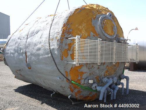 Used Stainless Metals Inc Tank, 8800 Gallon, 304L Stainless Steel, Vertical. Approximate 120" diameter x 180" straight side, dished top, flat bottom. Openings top (12) 3", 24" man way with cover, sid...