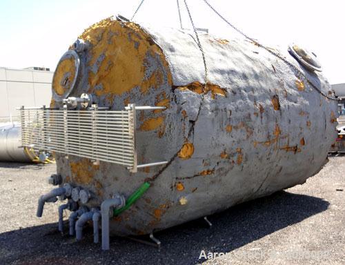 Used Stainless Metals Inc Tank, 8800 Gallon, 304L Stainless Steel, Vertical. Approximate 120" diameter x 180" straight side, dished top, flat bottom. Openings top (12) 3", 24" man way with cover, sid...