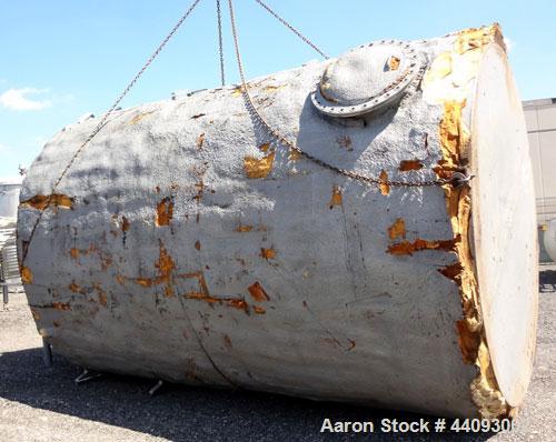 Used Stainless Metals Inc Tank, 8800 Gallon, 304L Stainless Steel, Vertical. Approximate 120" diameter x 180" straight side, dished top, flat bottom. Openings top (12) 3", 24" man way with cover, sid...