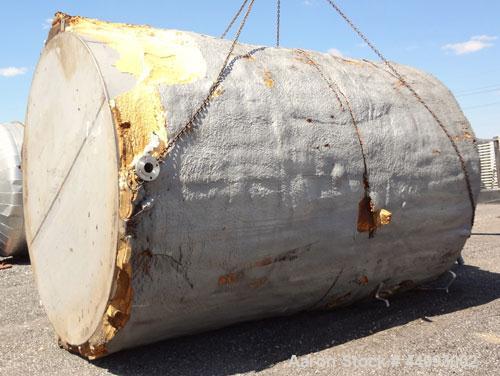 Used Stainless Metals Inc Tank, 8800 Gallon, 304L Stainless Steel, Vertical. Approximate 120" diameter x 180" straight side, dished top, flat bottom. Openings top (12) 3", 24" man way with cover, sid...