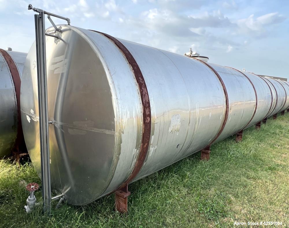 Used- Tolan Horizontal Tank, 5,800 Gallons, Stainless Steel. Approximate 78" diameter x 24' long, slight coned heads. Mounte...