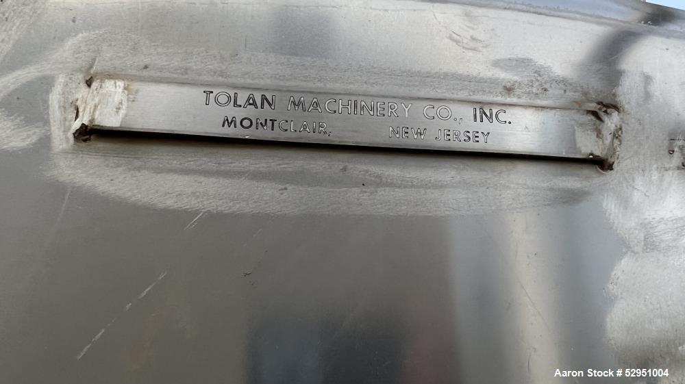 Used- Tolan Horizontal Tank, 5,800 Gallons, Stainless Steel. Approximate 78" diameter x 24' long, slight coned heads. Mounte...