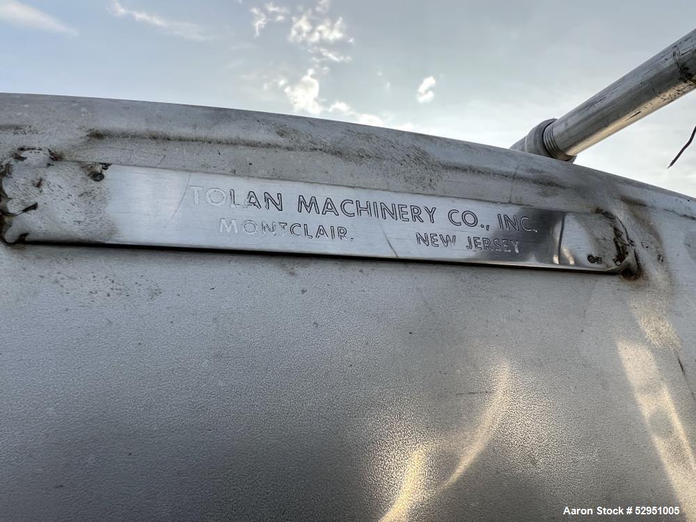 Used- Tolan Horizontal Tank, 5,800 Gallons, Stainless Steel. Approximate 78" diameter x 24' long, slight coned heads. Mounte...