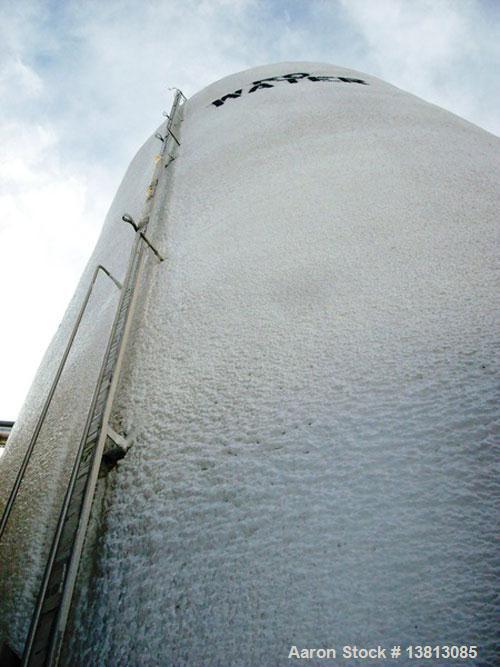 Used Valley Foundry 13,000 Gallon Vertical Stainless Insulated Tank. Vertical flat bottom tank with spray-on insulation and sightglass. Bottom front 3" outlet. Bottom side manway. 10'2" External diam...