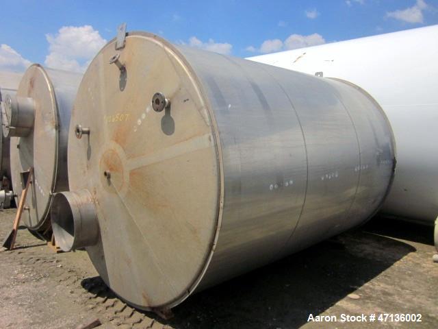 Used Valley Foundry & Machine Works Tank, Approximate 5,000 Gallon, 304 Stainless Steel, Vertical. Approximately 102" diameter x 143" straight side, slight cone top, 4” sloped bottom. Top openings 24...