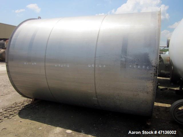 Used Valley Foundry & Machine Works Tank, Approximate 5,000 Gallon, 304 Stainless Steel, Vertical. Approximately 102" diameter x 143" straight side, slight cone top, 4” sloped bottom. Top openings 24...
