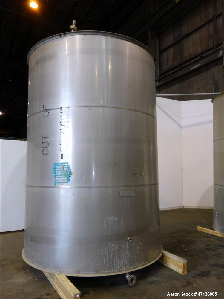 Used Valley Foundry & Machine Works Tank, Approximate 5,000 Gallon, 304 Stainless Steel, Vertical. Approximately 102" diameter x 143" straight side, slight cone top, sloped bottom. Top openings: 24" ...