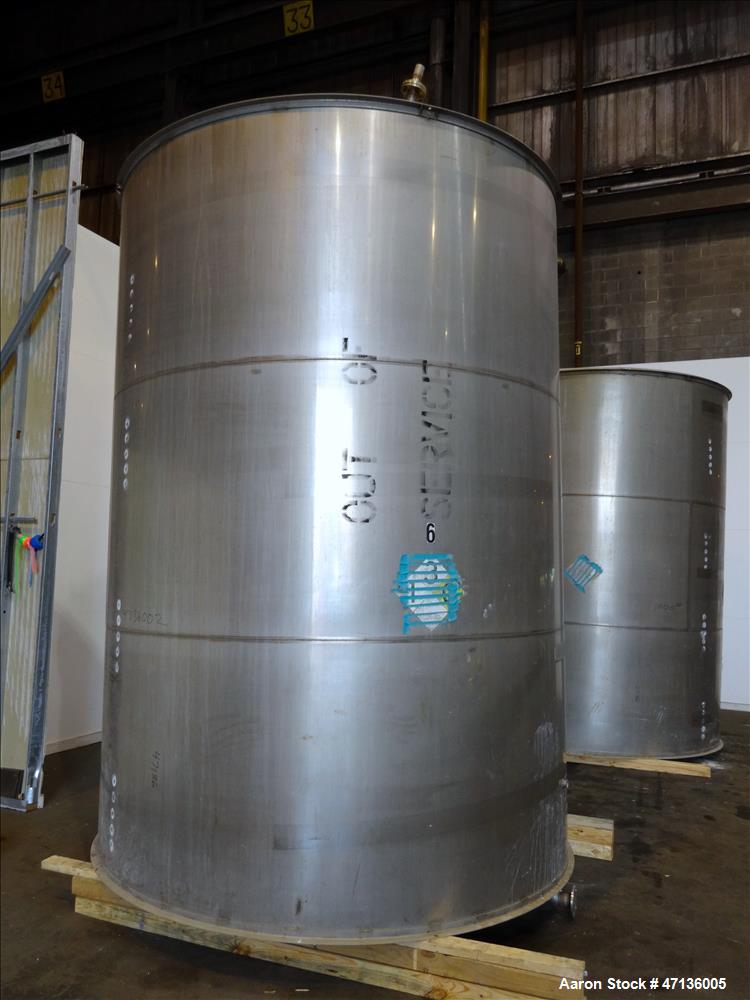 Used Valley Foundry & Machine Works Tank, Approximate 5,000 Gallon, 304 Stainless Steel, Vertical. Approximately 102" diameter x 143" straight side, slight cone top, sloped bottom. Top openings: 24" ...
