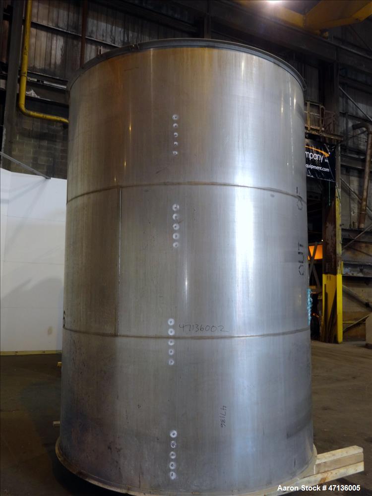 Used Valley Foundry & Machine Works Tank, Approximate 5,000 Gallon, 304 Stainless Steel, Vertical. Approximately 102" diameter x 143" straight side, slight cone top, sloped bottom. Top openings: 24" ...
