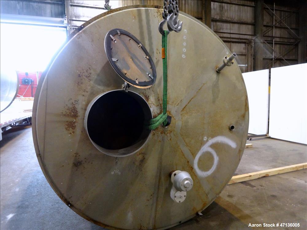 Used Valley Foundry & Machine Works Tank, Approximate 5,000 Gallon, 304 Stainless Steel, Vertical. Approximately 102" diameter x 143" straight side, slight cone top, sloped bottom. Top openings: 24" ...