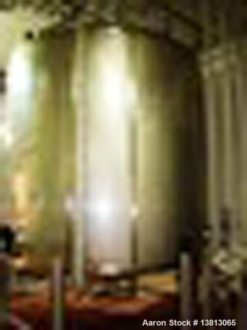 Used Walker 7,000 Gallon, Type 316L Stainless Steel Vertical Mixing Tank, Model CB. Built in 2007. 11'3" diameter x 10' straight side, 16' overall height. 3 hp side agitator. Has sight glass and bott...