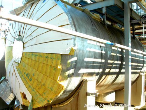 USED: Walker Stainless tank, 8,500 gallon, 316 stainless steel, horizontal. Approximately 9' diameter x 16'9" straight side, dished ends. Internal rated 15 psi at 200 deg F. Openings: top 1", (3) 2",...