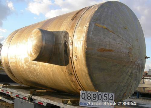 USED: Walker Stainless tank, 8,500 gallon, 316 stainless steel, horizontal. Approximately 9' diameter x 16'9" straight side, dished ends. Internal rated 15 psi at 200 deg F. Openings: top 1", (3) 2",...