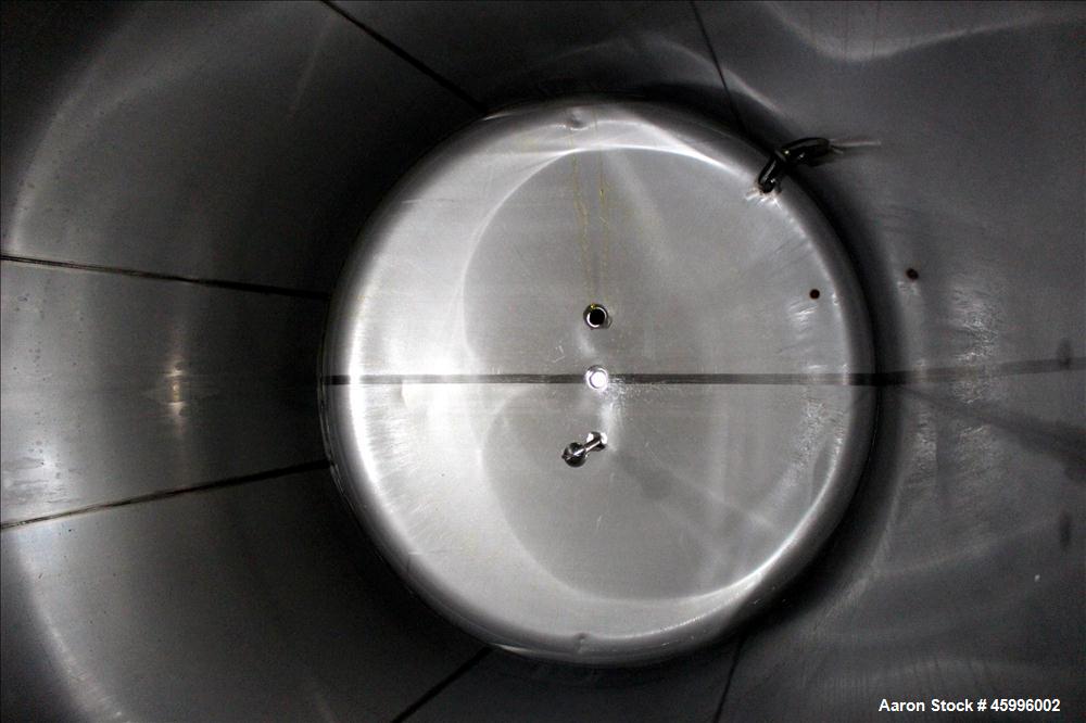Used Walker Stainless Tank, Model SS, 6,000 Gallon, 304 Stainless Steel, Vertical. 102" Diameter x 168" straight side. Dished top and bottom heads. Internal rated atmospheric psi at ambient degrees F...